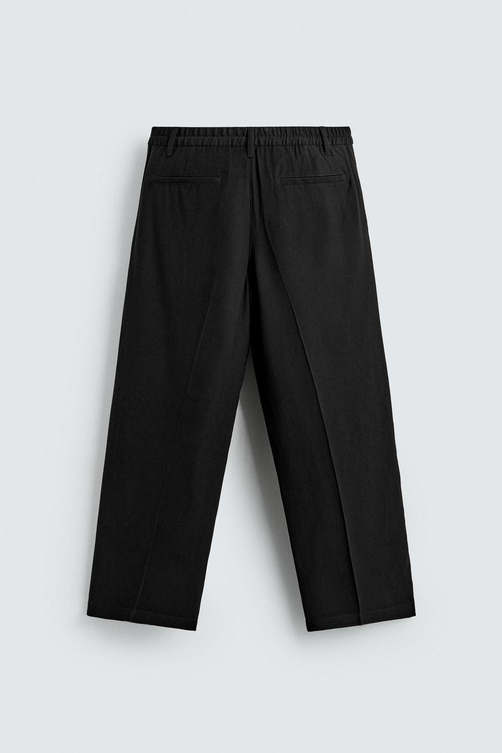 PANTAL?N FLUIDO RELAXED FIT PLIEGUES / Negro