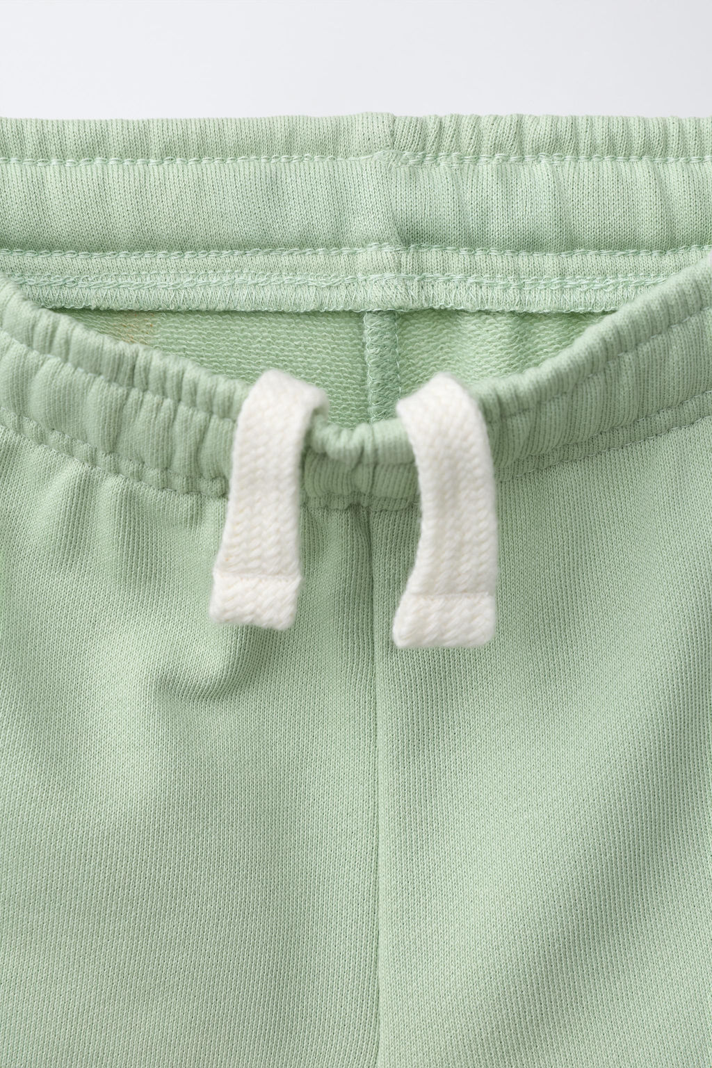 BERMUDA JOGGING TEXTO / Verde agua