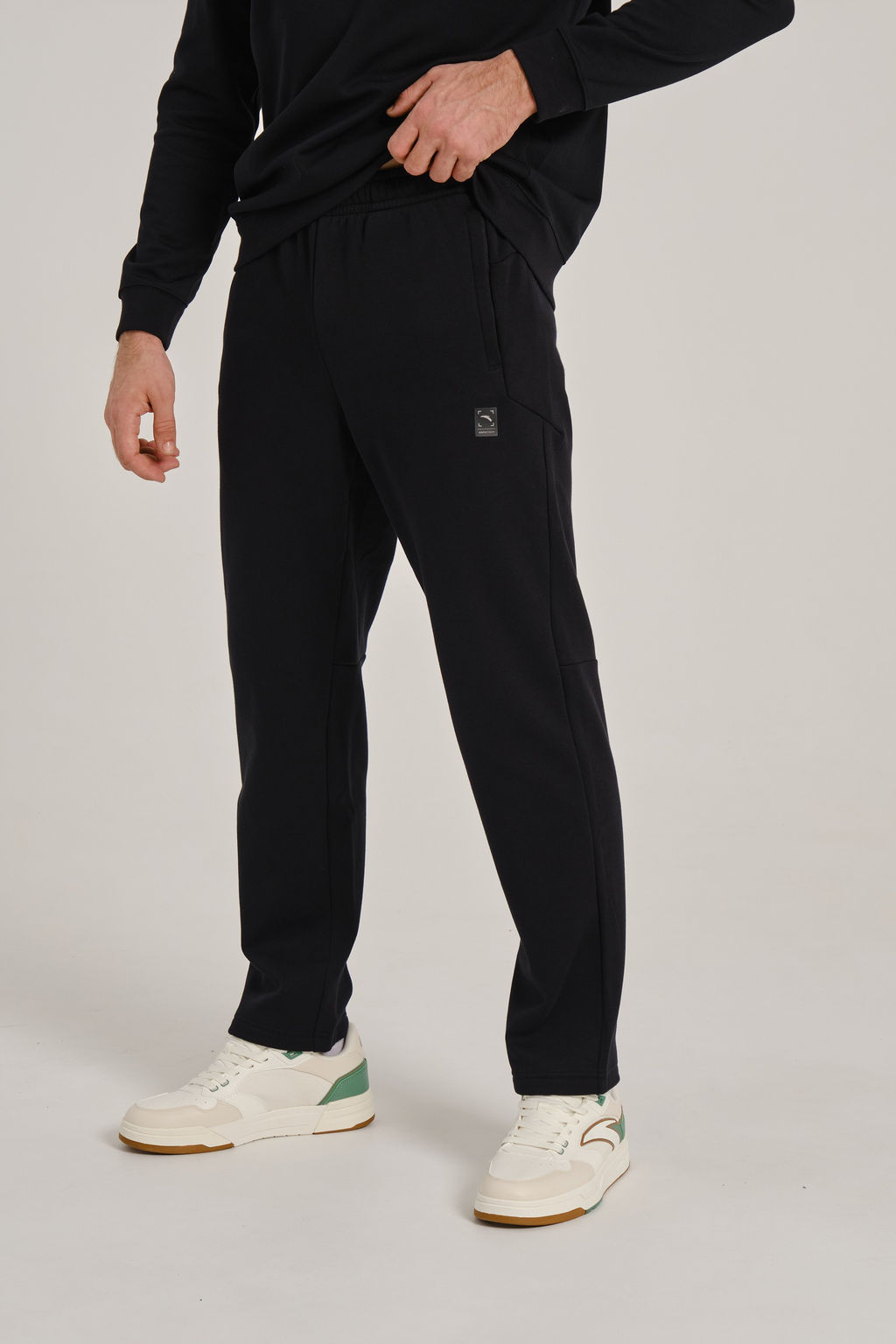 Брюки трикотажные утепленные Черный TRN Knit Track Pants - Anta фото 4