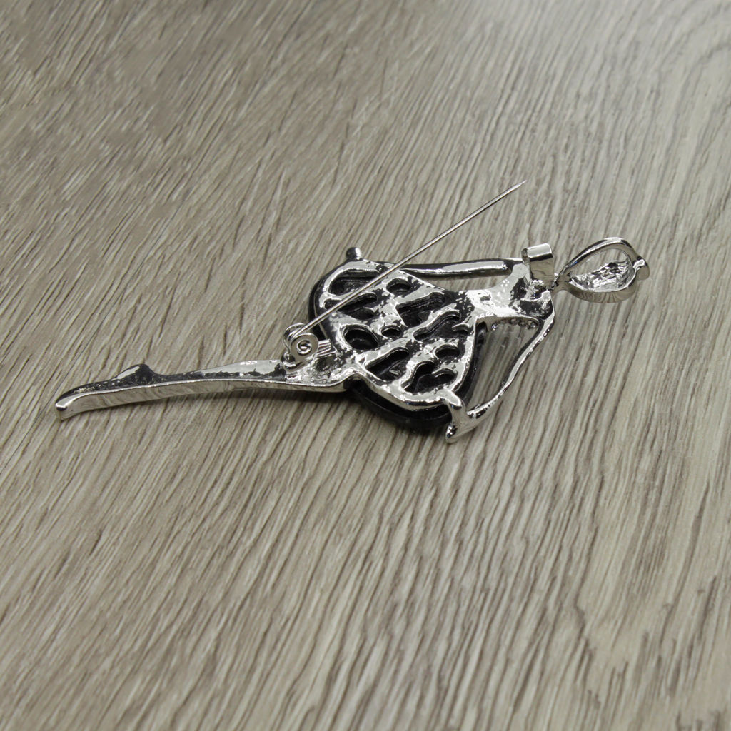 Брошь-подвеска "Балерина" со вставкой из гелиотиса