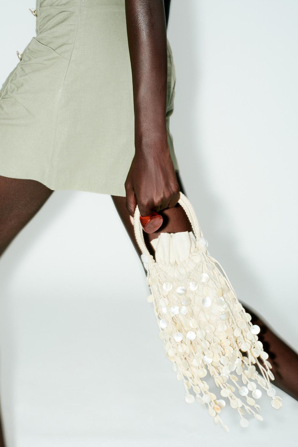 PEARLESCENT APPLIQUE HANDBAG