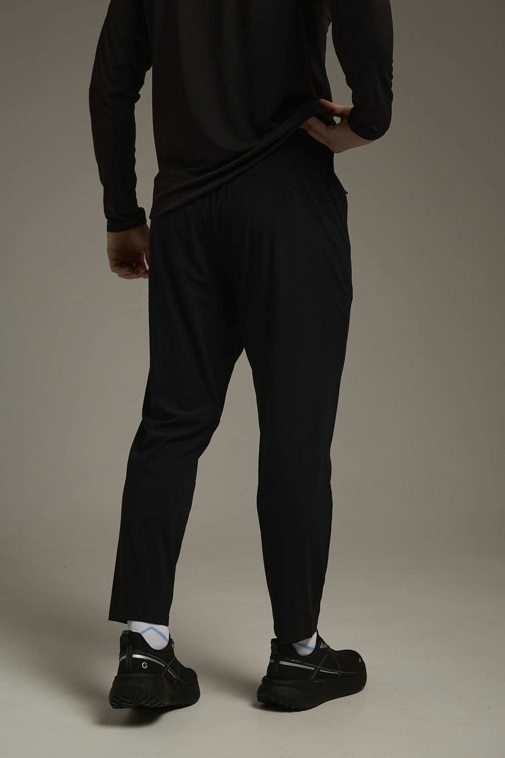 Брюки трикотажные укороченные Черный ADVANCED RUNNING Knit Ankle Pants - Anta фото 3