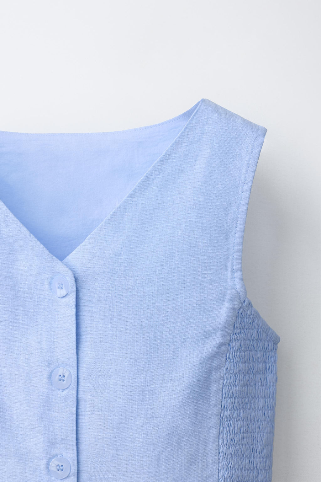 CHALECO NIDO DE ABEJA CON LINO / Azul cielo