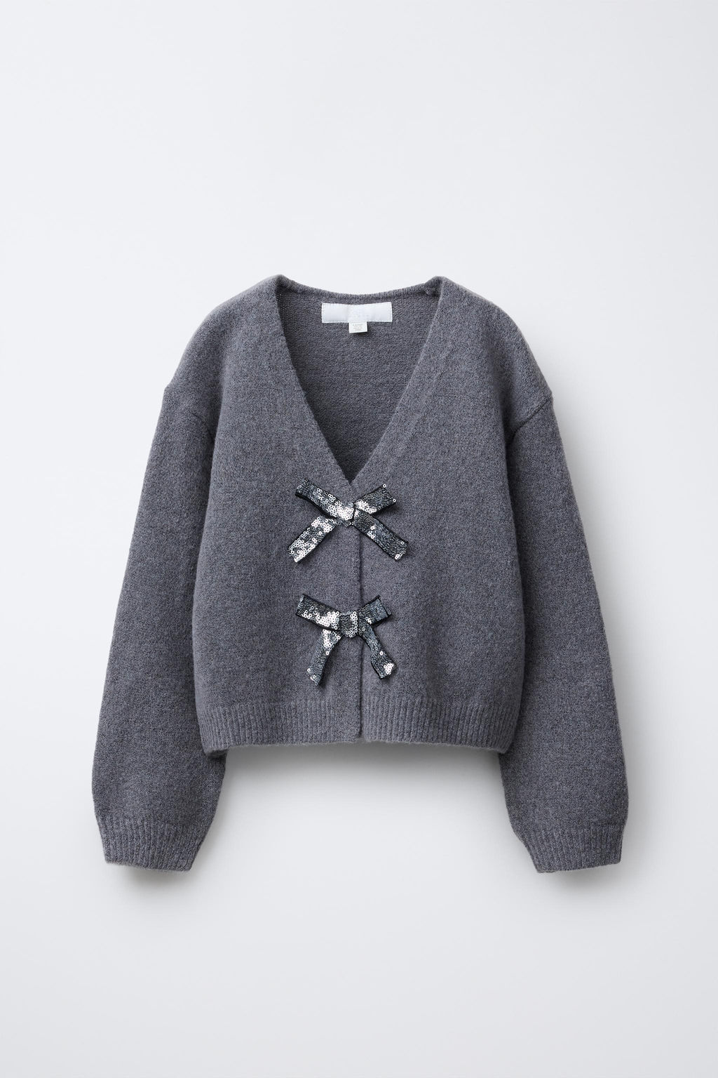 V-NECK KNIT CARDIGAN WITH SHIMMERING BOWS