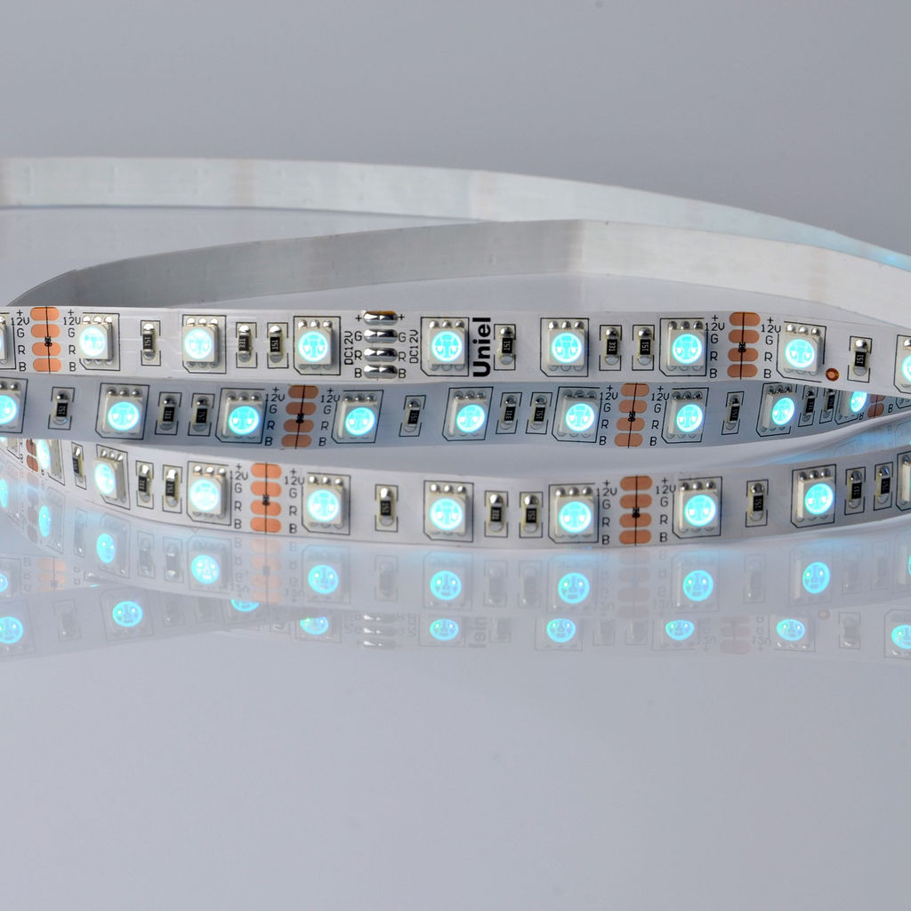 ULS-5050-60LED/m-10mm-IP20-DC24V-14,4W/m-5M-RGB Гибкая светодиодная лента UNIEL на самоклеящейся основе. Упаковка - катушка 5 м. в герметичной упаковке. IP20. Угол излучения 120 . Мультиколор.