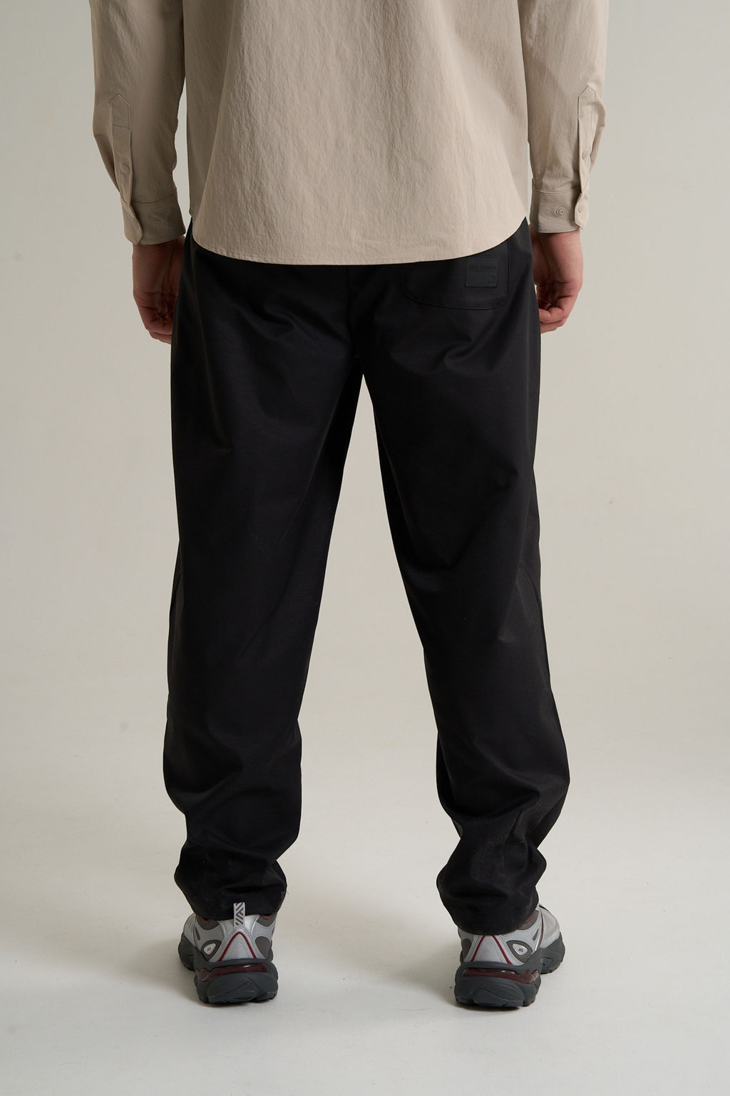 Брюки текстильные Черный COMMUTE Woven Track Pants - Anta фото 6