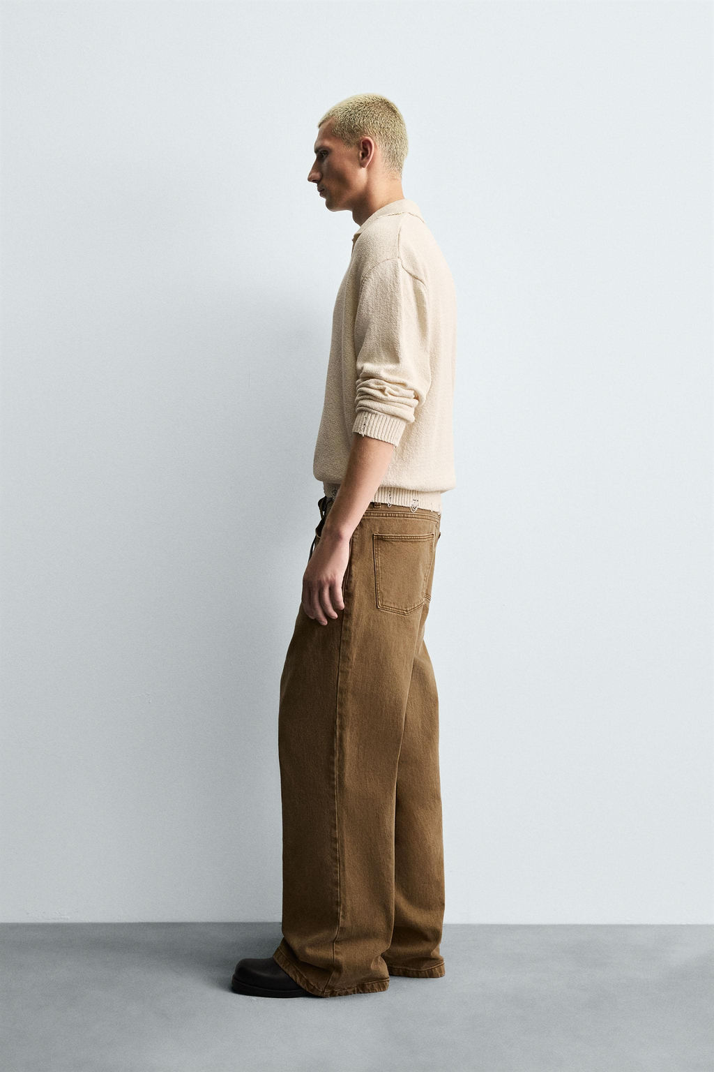 KNITTED RIPPED-EFFECT POLO SHIRT