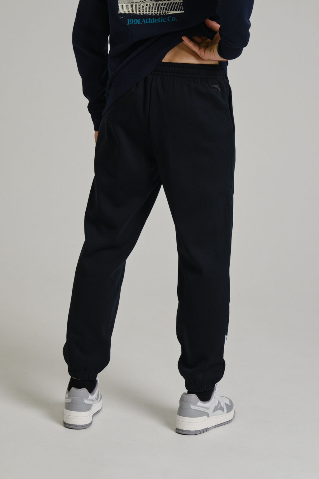 Брюки трикотажные утепленные Черный CLASSIC Knit Track Pants - Anta фото 5