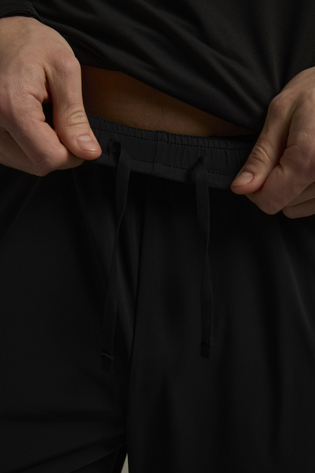 Брюки трикотажные укороченные Черный ADVANCED RUNNING Knit Ankle Pants - Anta фото 4