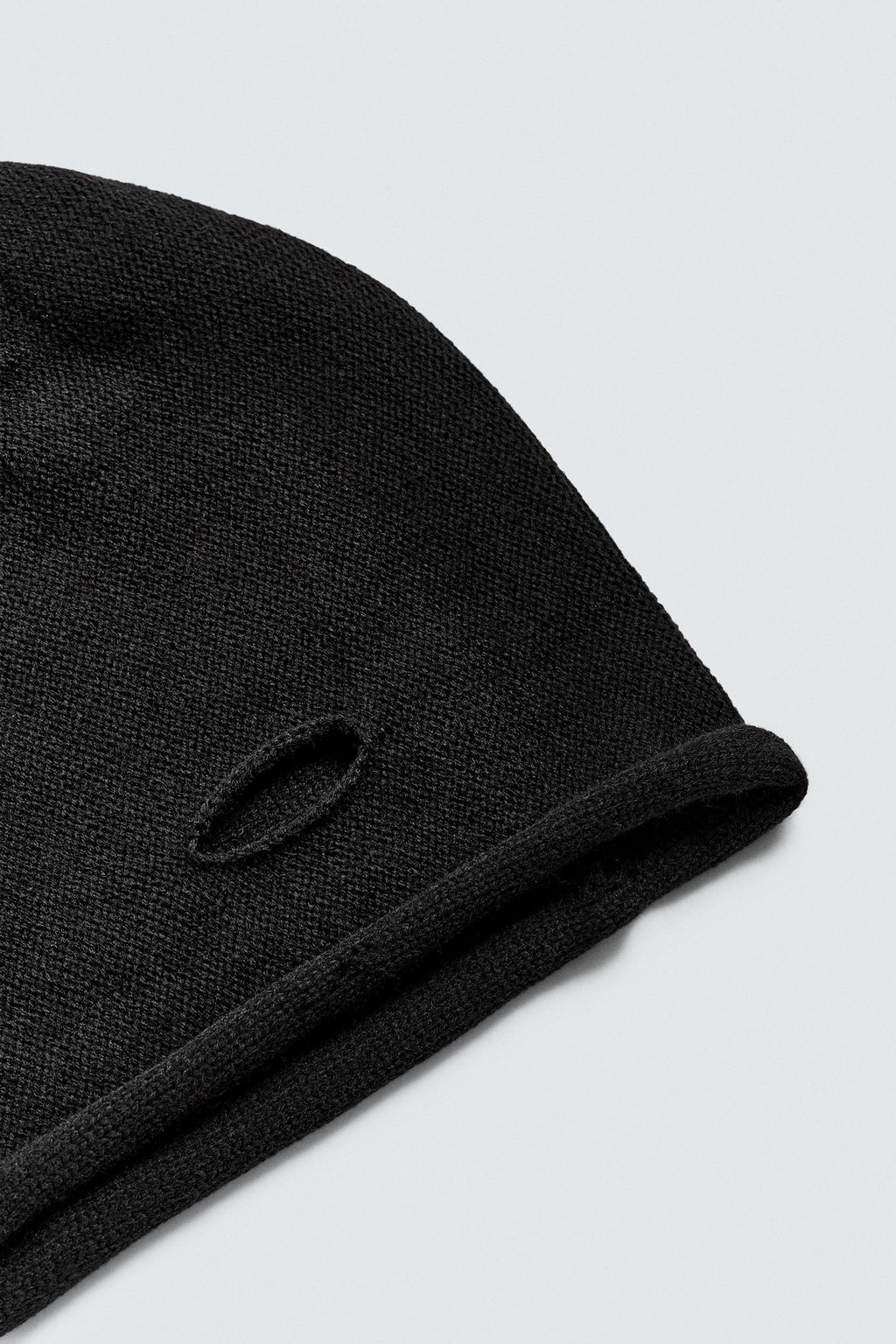 DISTRESSED KNIT BEANIE