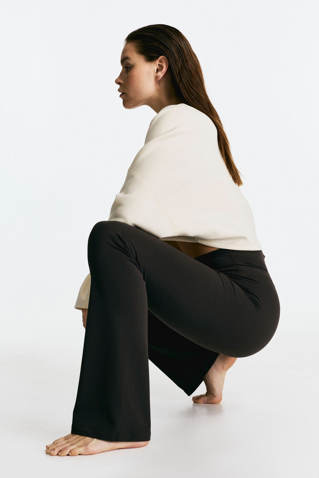 Leggings de yoga acampanados con SoftMove Lycra® - H&m фото 4