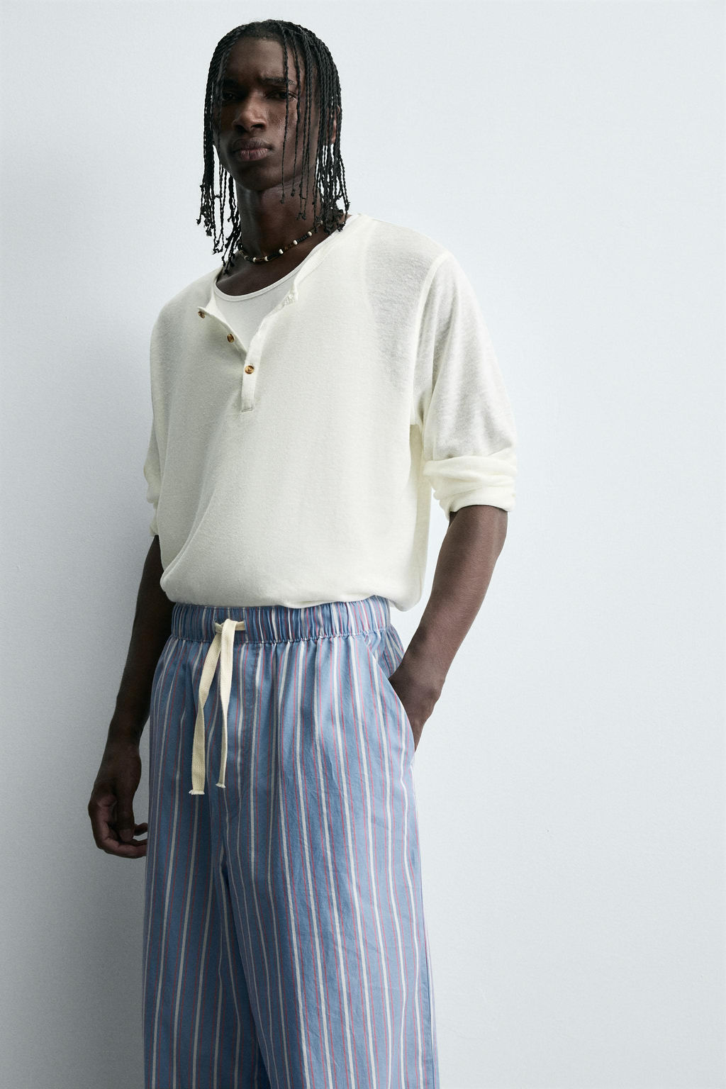 STRIPED OVERSIZE FIT TROUSERS