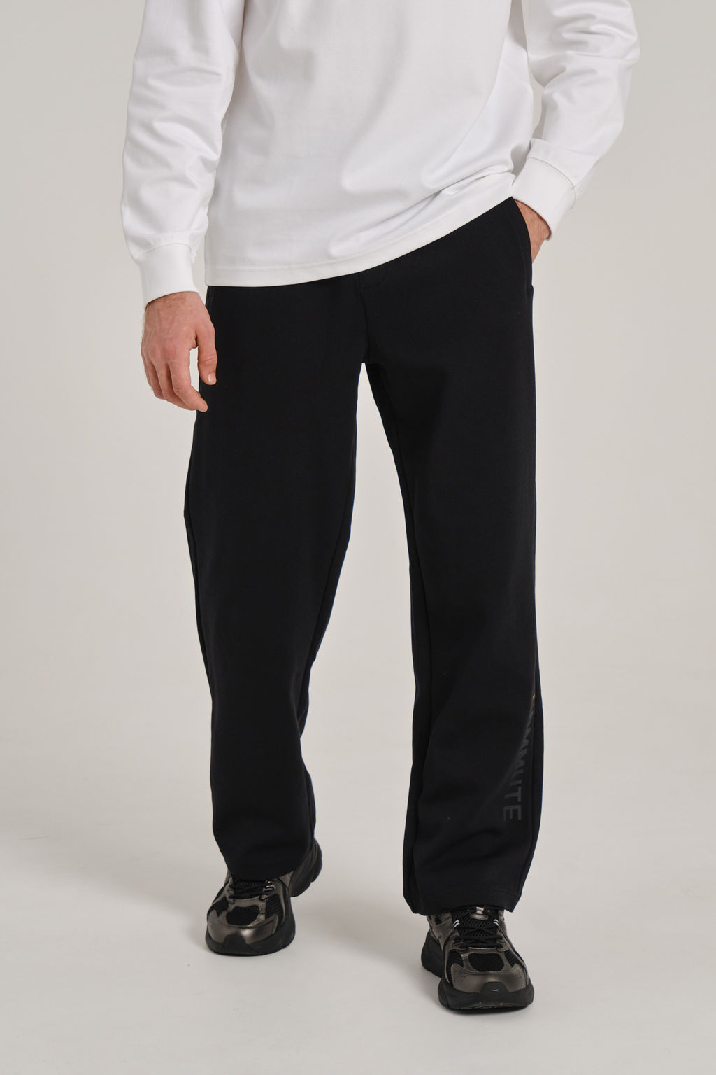 Брюки трикотажные Черный COMMUTE Knit Track Pants - Anta фото 4