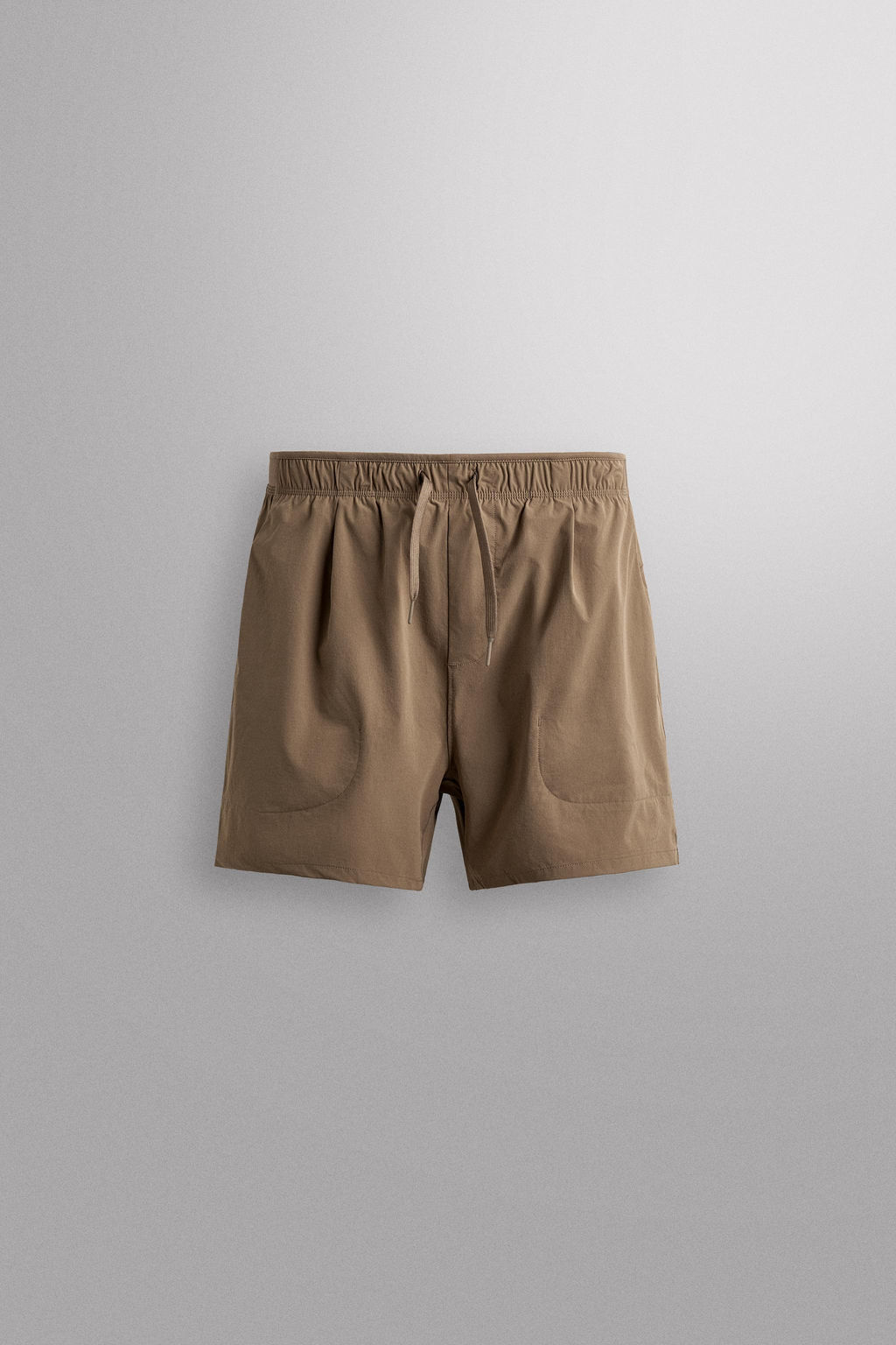 PANTALONES CORTOS T?CNICOS TRAINING / Marr?n claro