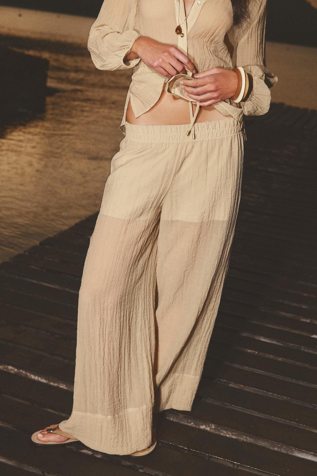 WIDE SEMI-SHEER CREASED-EFFECT TROUSERS - Zara фото 2