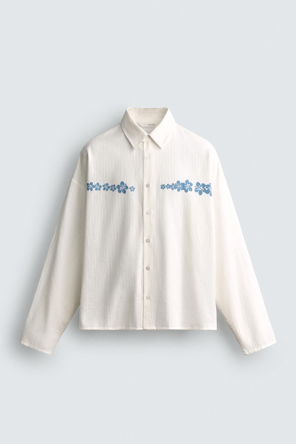 CAMISA RELAXED FIT ESTAMPADO FLORES / Blanco