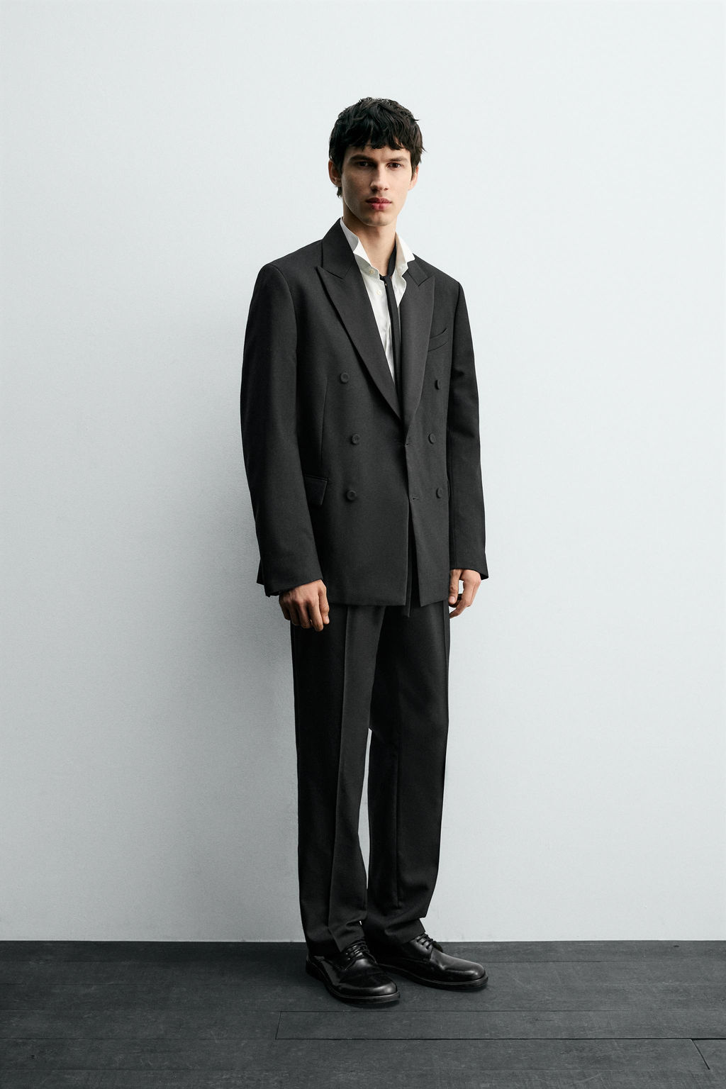PLEATED SUIT TROUSERS