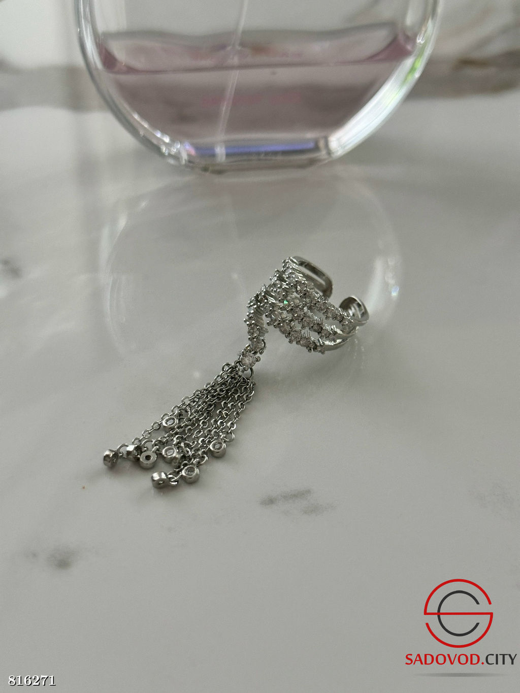 Кольцо с подвесными цепочками