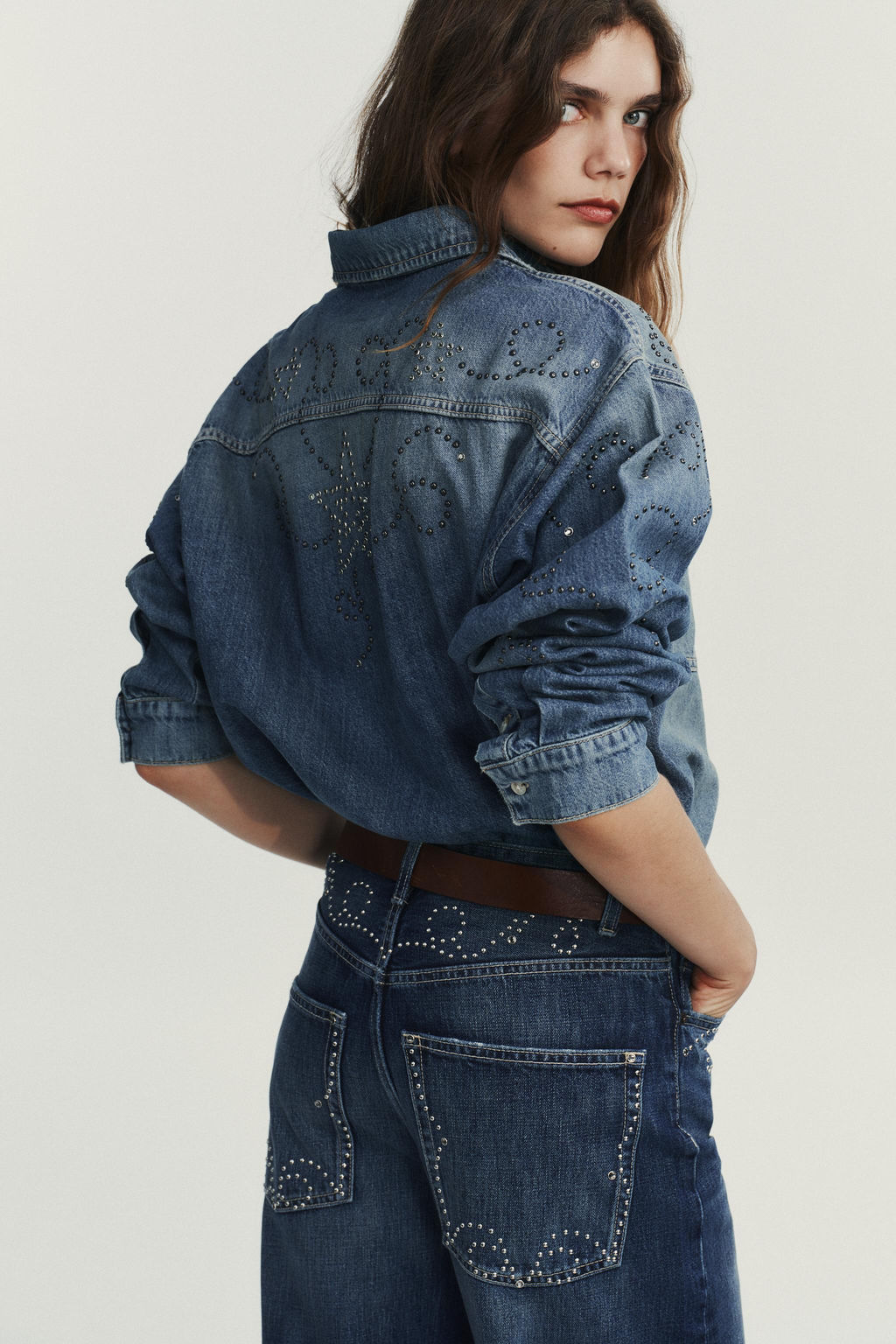 TRF JEANS WITH METAL STUDS